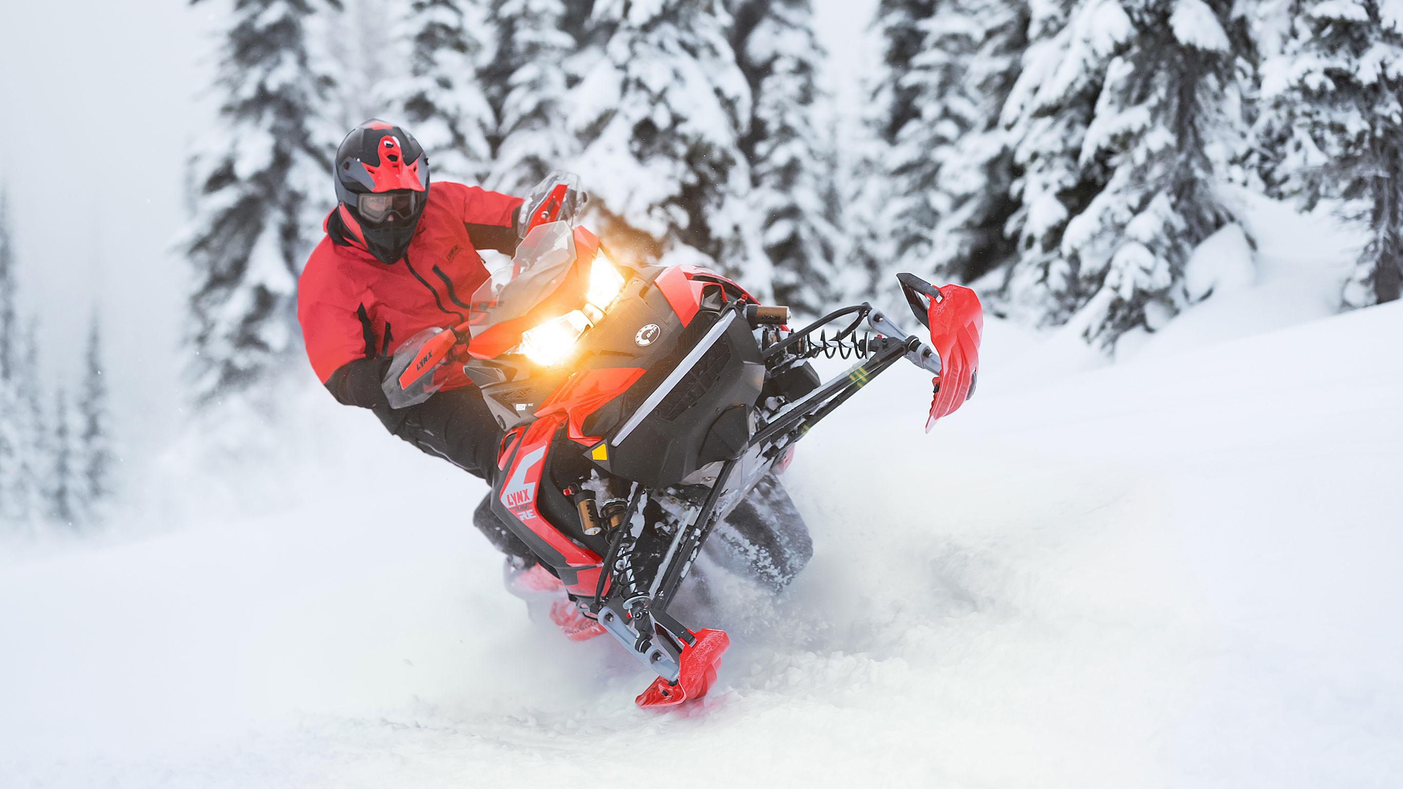 Lynx Rave snowmobiles sporty riding on bumpy trail