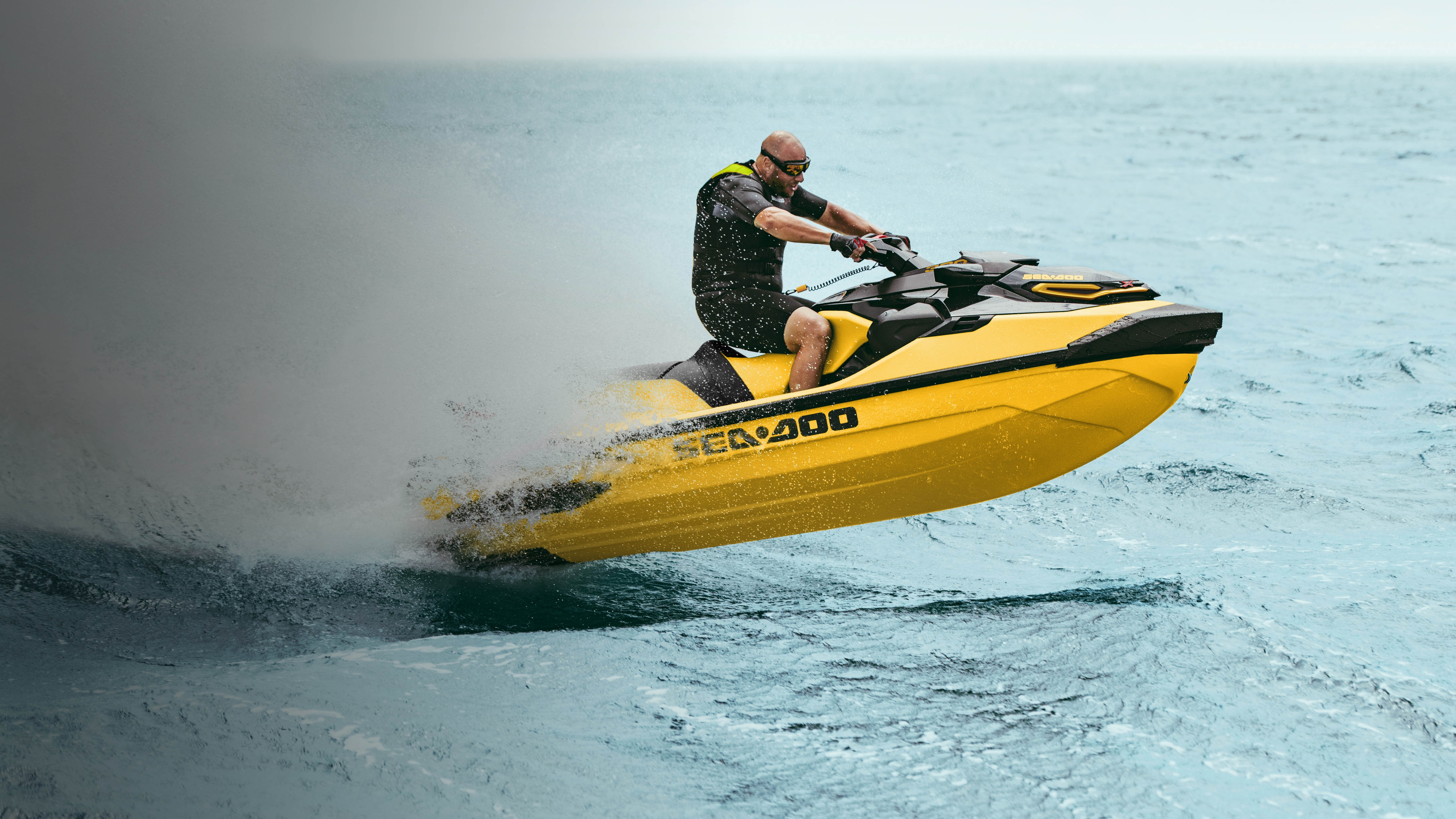 Man speeding with a Sea-Doo RXT-X and its stable hull