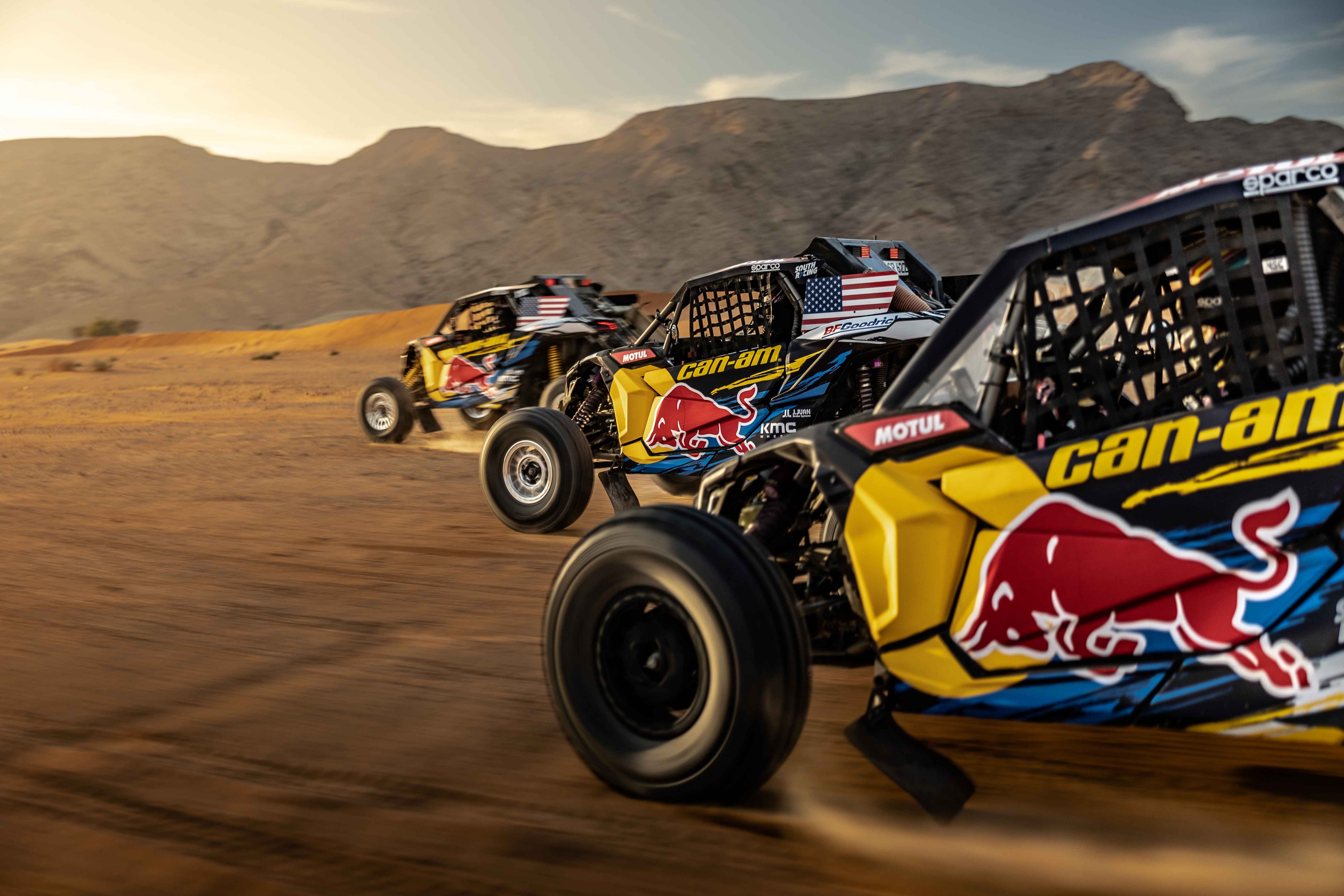 3 Maverick racing in the desert