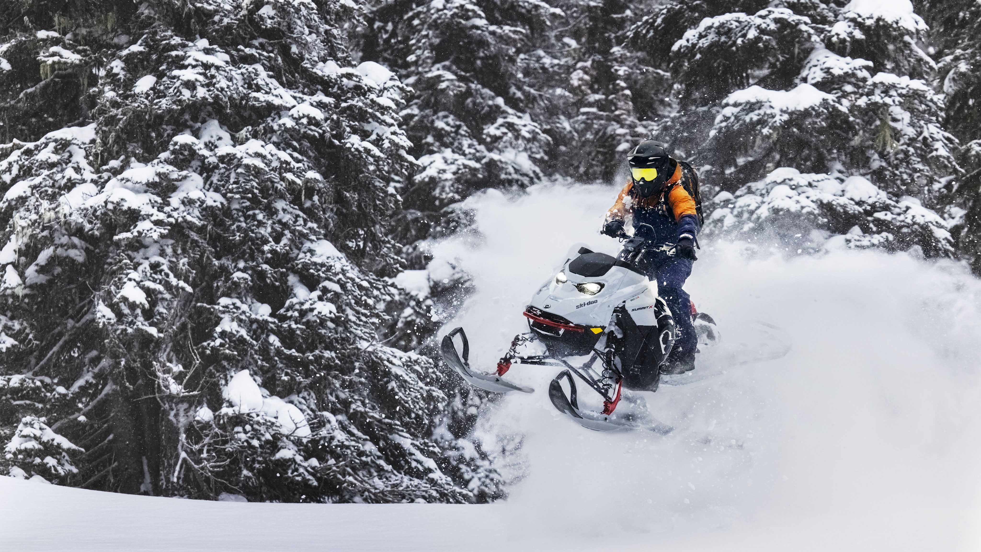 2023 Ski-Doo Summit jumping during an Off-Trail session