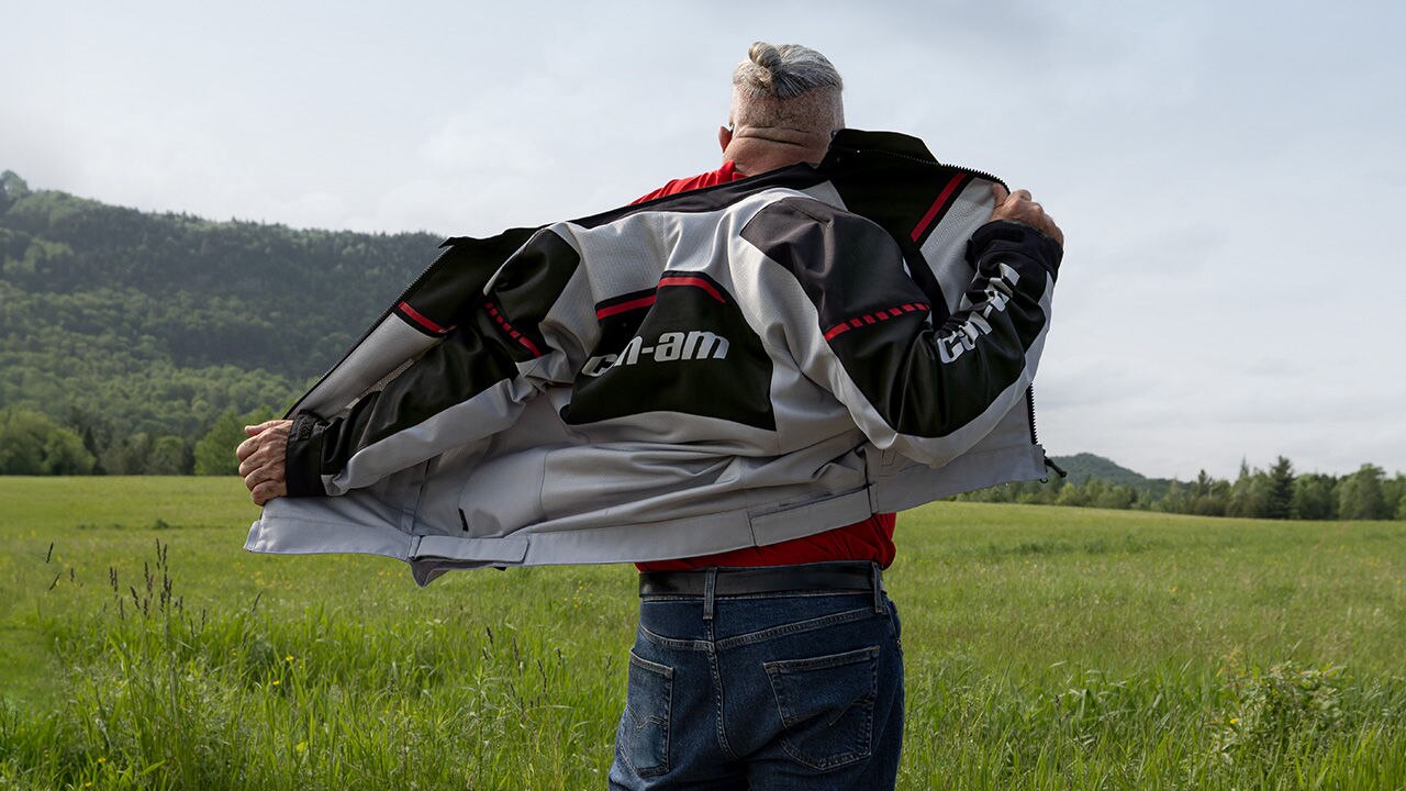 Several people taking their Can-Am 3-wheel motorcycle driving test