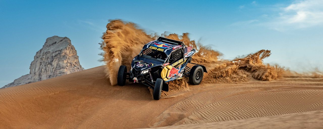 Maverick riding on a sand dune in Saudi Arabia 