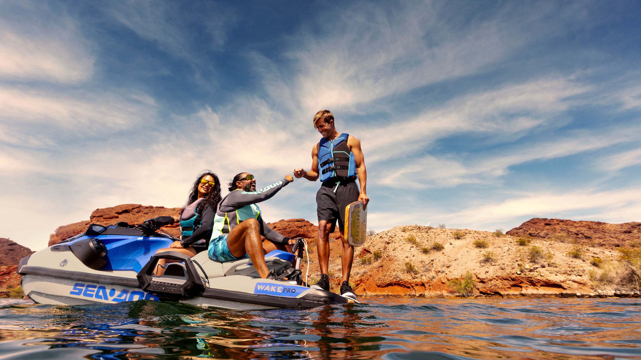 Group of friends enyoing a Wake ride with the Sea-Doo Wake Pro