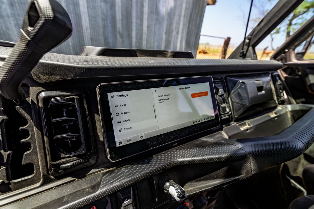 Dashboard view of the 2027 Can-Am Defender SxS with the touchscreen display