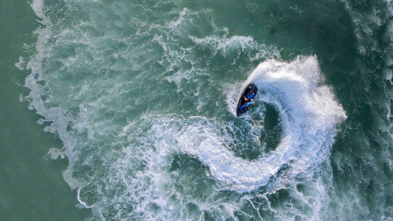 Birdview of a Sea-Doo SPARK TRIXX making donuts