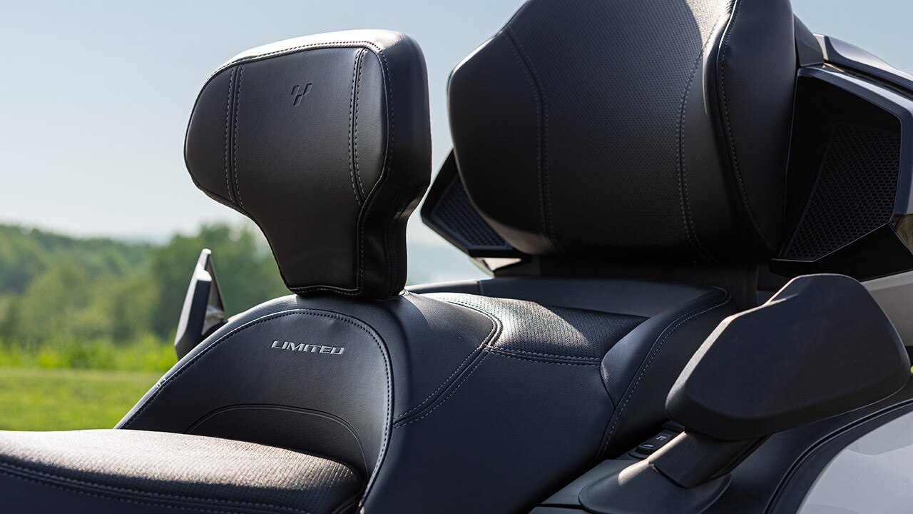 Several people taking their Can-Am 3-wheel motorcycle driving test