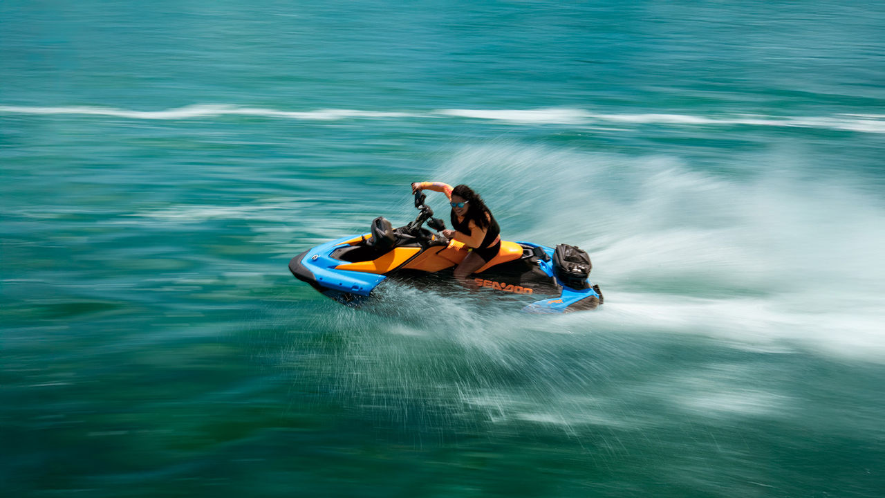 Man and ladies with Sea-Doo Personal Watercrafts