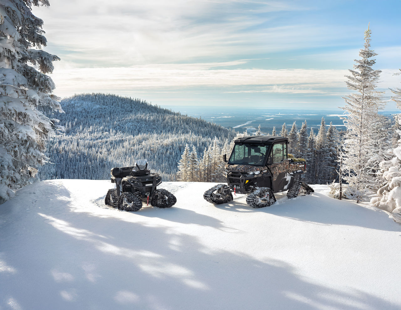 Can-Am Outlander & Traxter equipped with track systems for winter riding