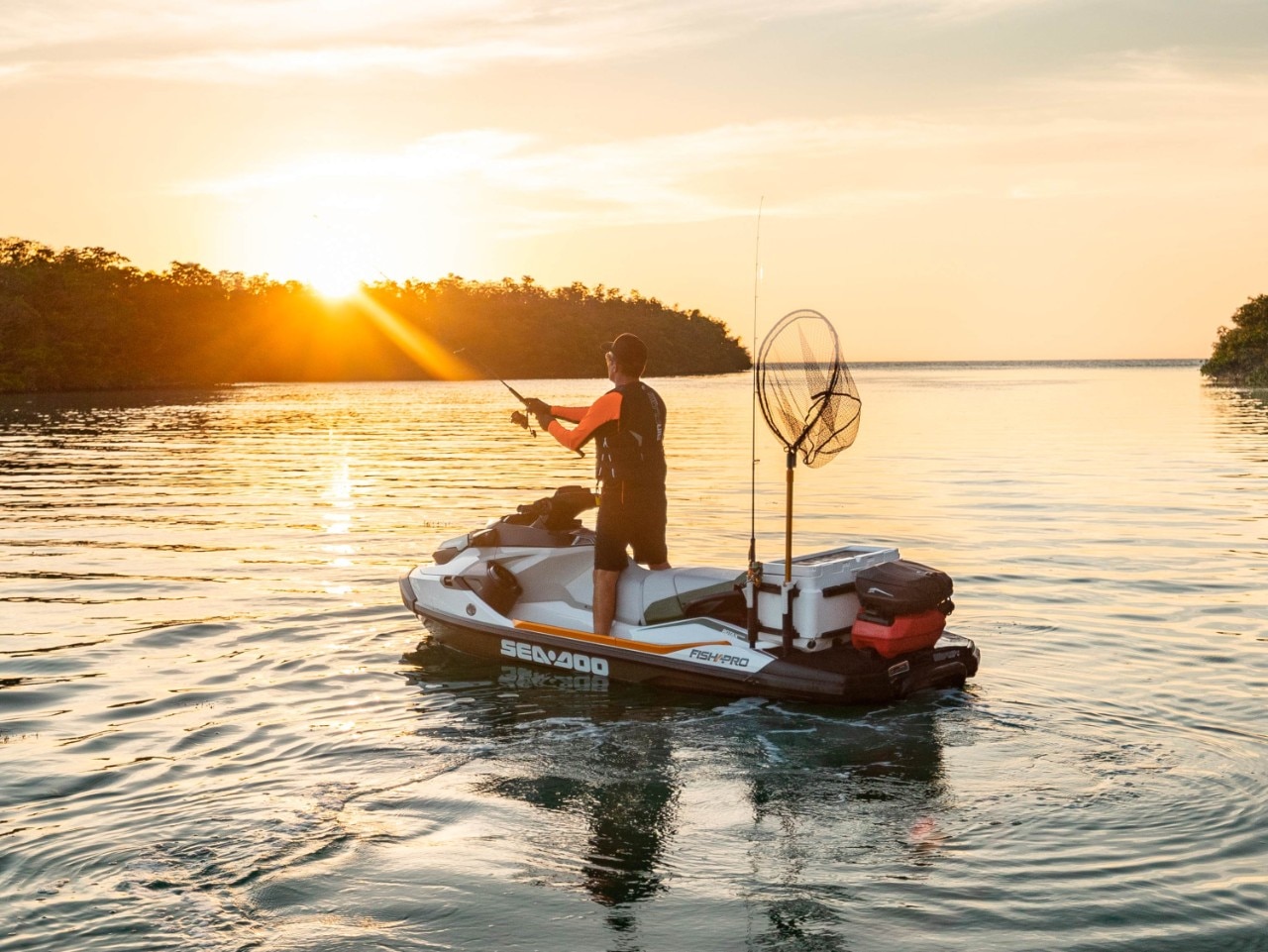 Man fishing while standing up on his Sea-Doo Fish Pro
