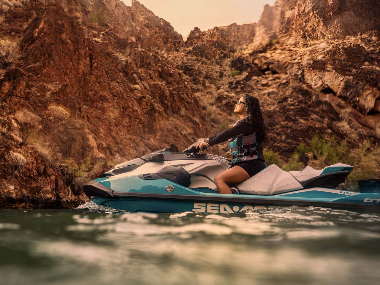 Woman on the 2025 Lynx Brutal snowmobile