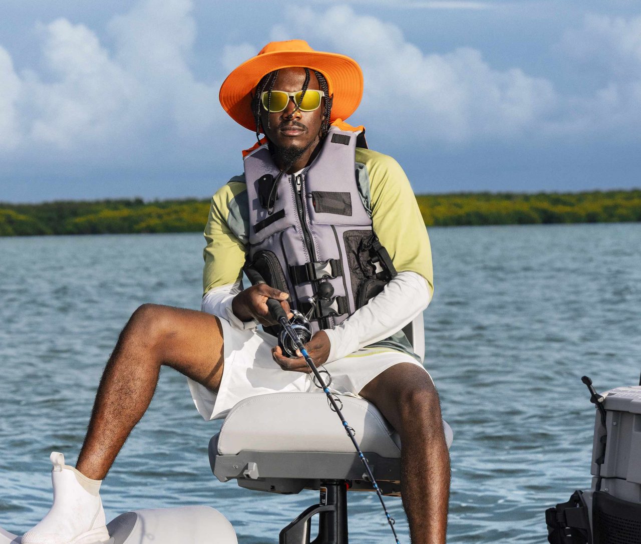 Man fishing on her Sea-Doo FishPro Trophy with the modular swivel seat