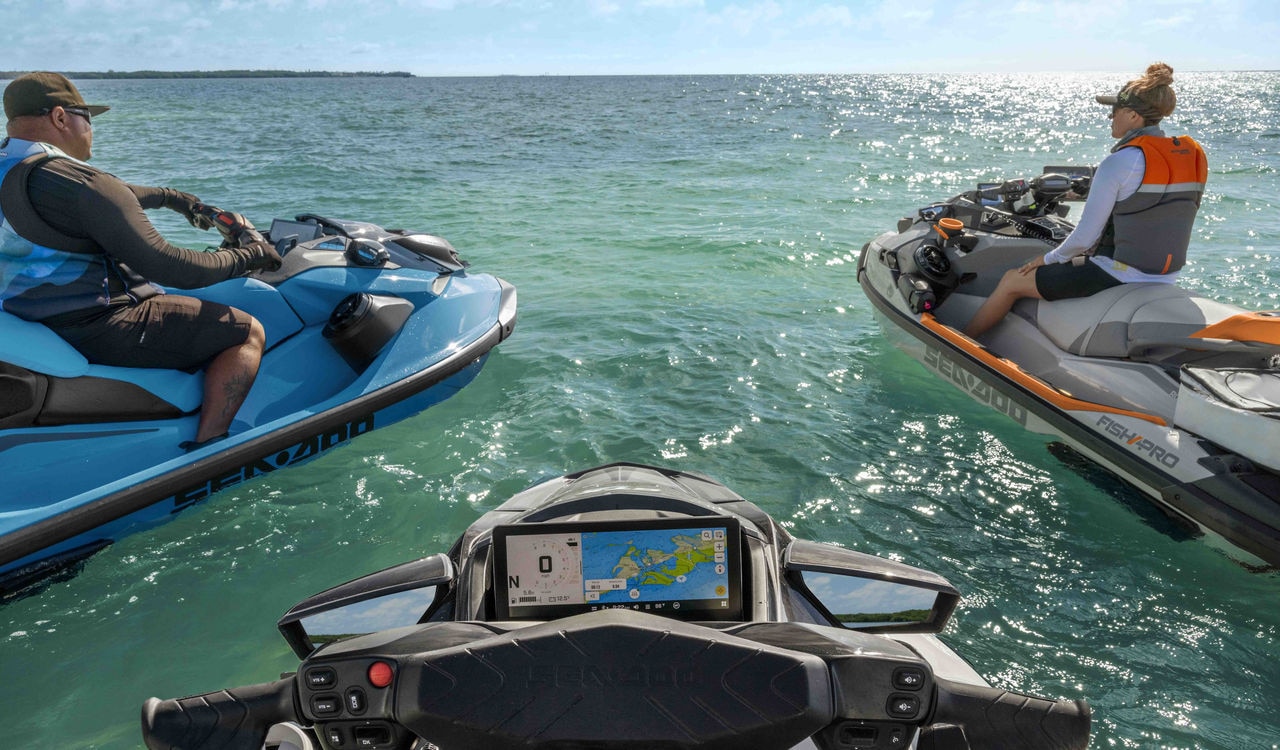 Woman pulling off a trick on a 2025 Sea-Doo Spark Trixx personal watercraft