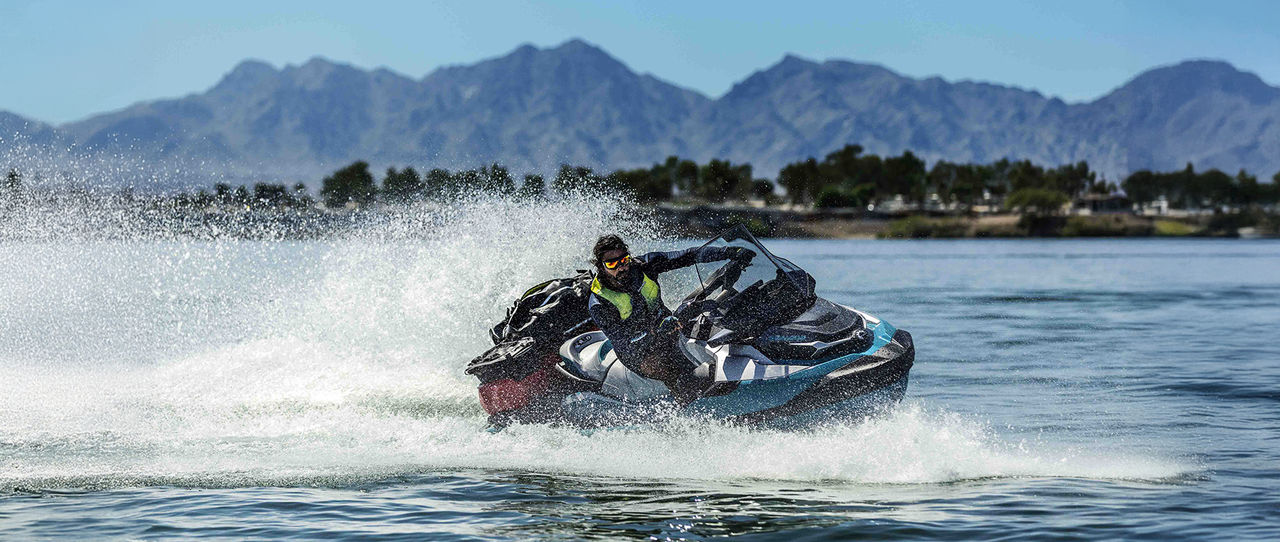 A man riding his fully equipped 2026 Sea-Doo GTX personal watercraft