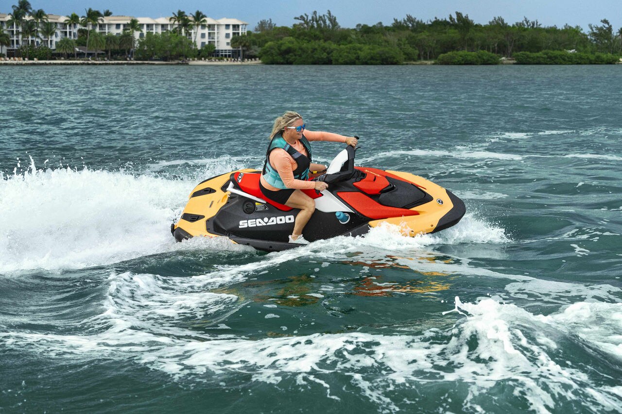 Woman riding a 2024 Sea-Doo Spark 2UP personal watercraft