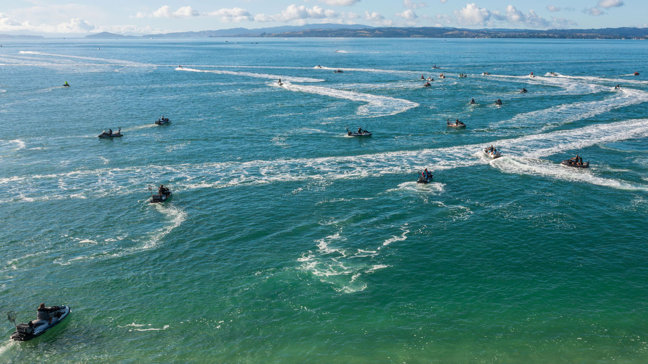 Gathering of Personal Watercraft Enthusiasts at a Sea-Doo Social Club Event