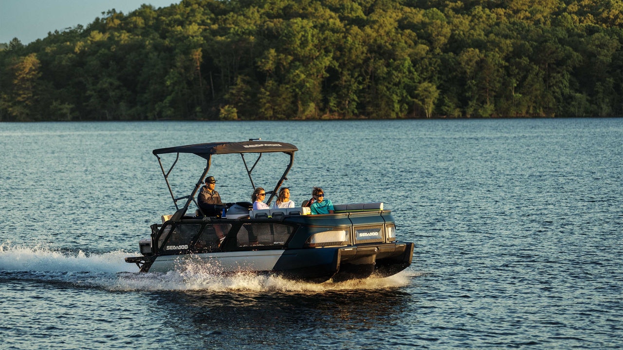 Family enjoying a peaceful water ride on a Sea-Doo Switch Limited