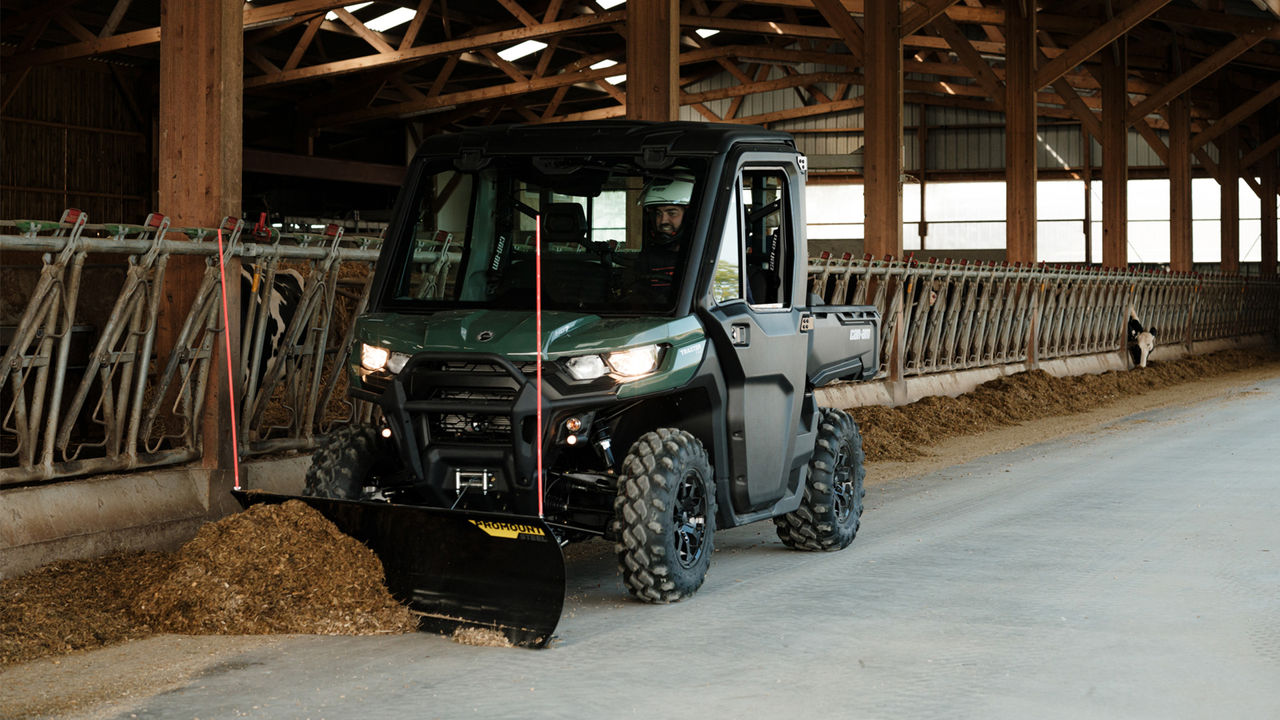 Man driving a Can-Am Maverick in the sand