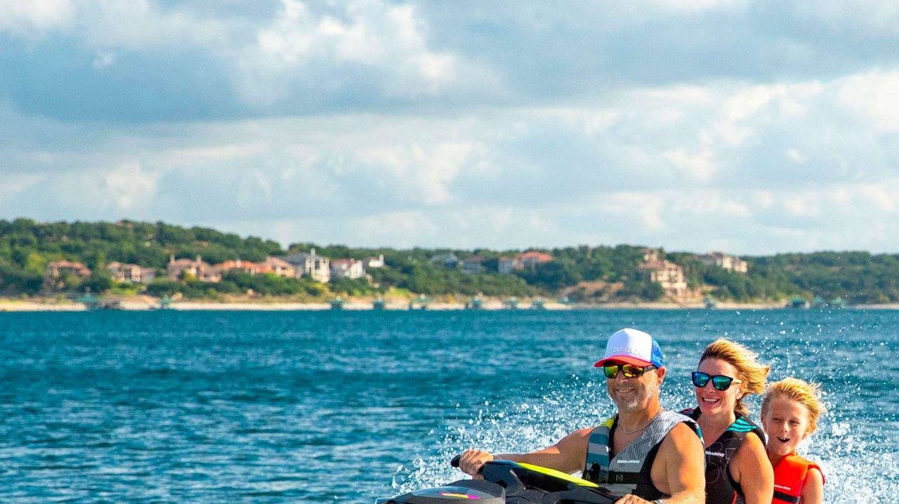 Family riding a Sea-Doo Wake 170
