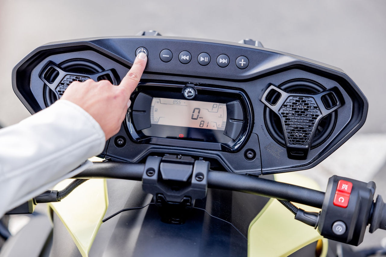Several people taking their Can-Am 3-wheel motorcycle driving test