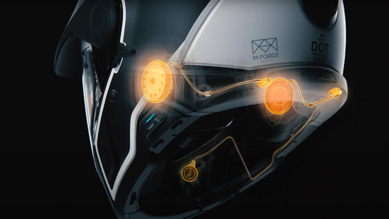 Vibe communication system in a safety riding helmet for off-roading