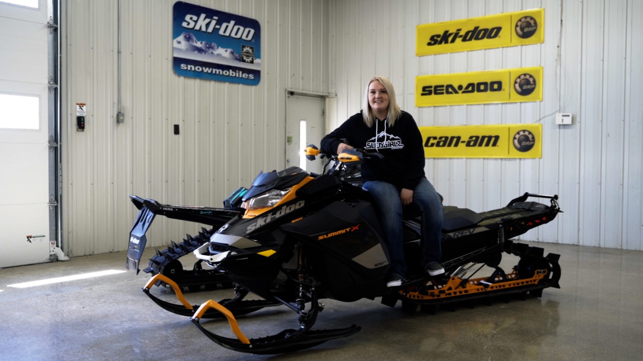 Ashleigh Abner on her Ski-Doo Summit snowmobile