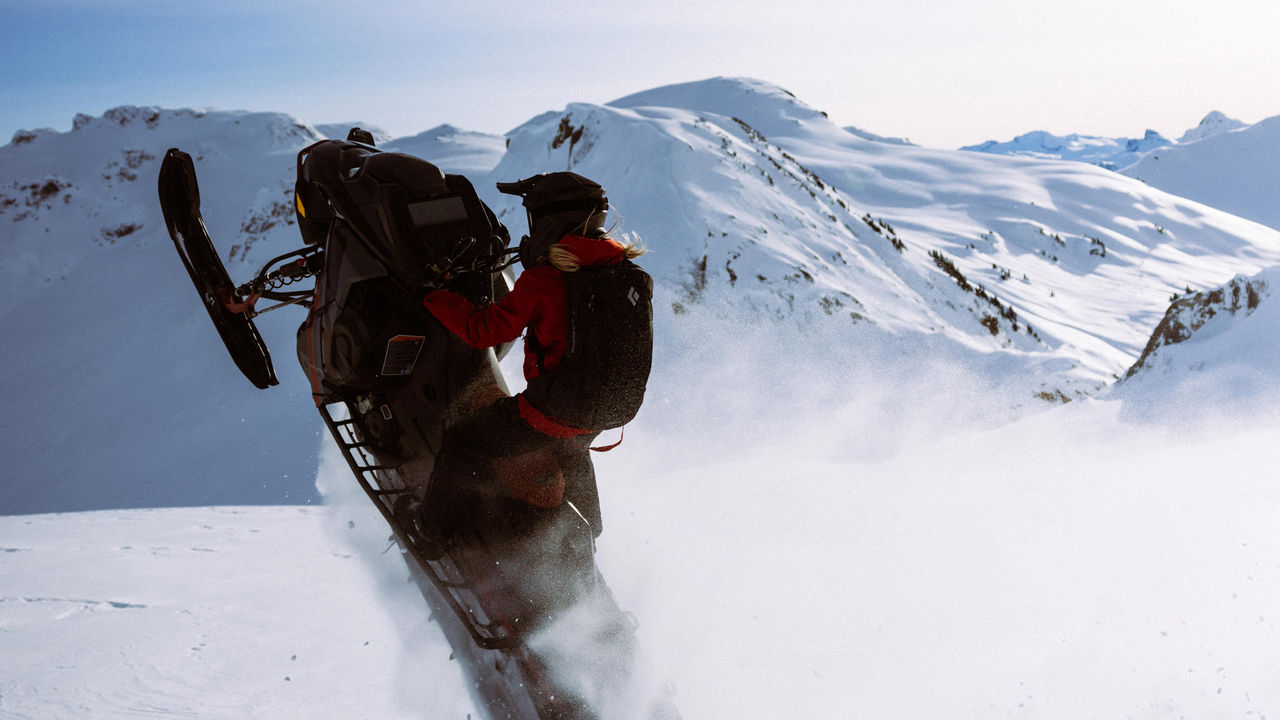 Ella Snäll making a wheelie on a Freeride