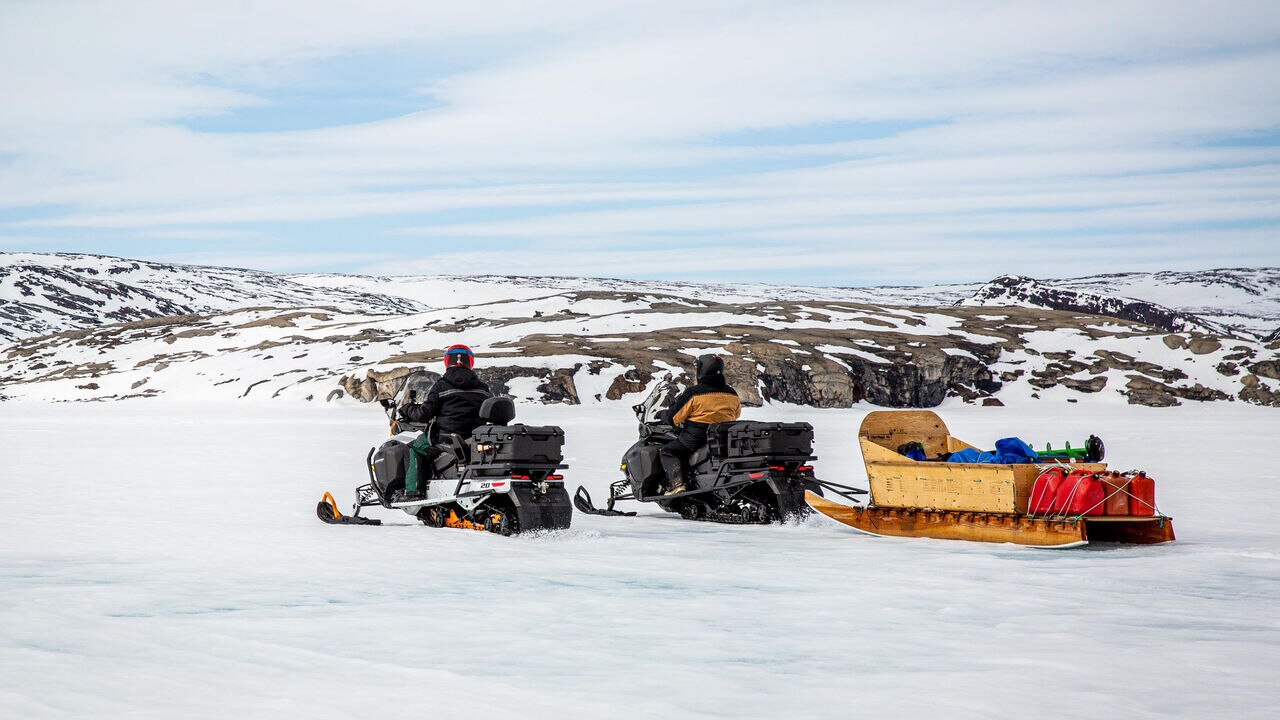 Two man on their Ski-Doo snowmobiles