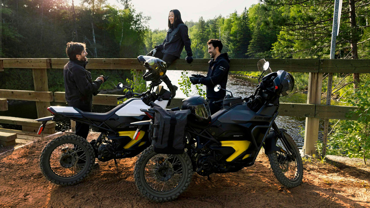 Two people aboard Can-Am's 100% electric motorcycle