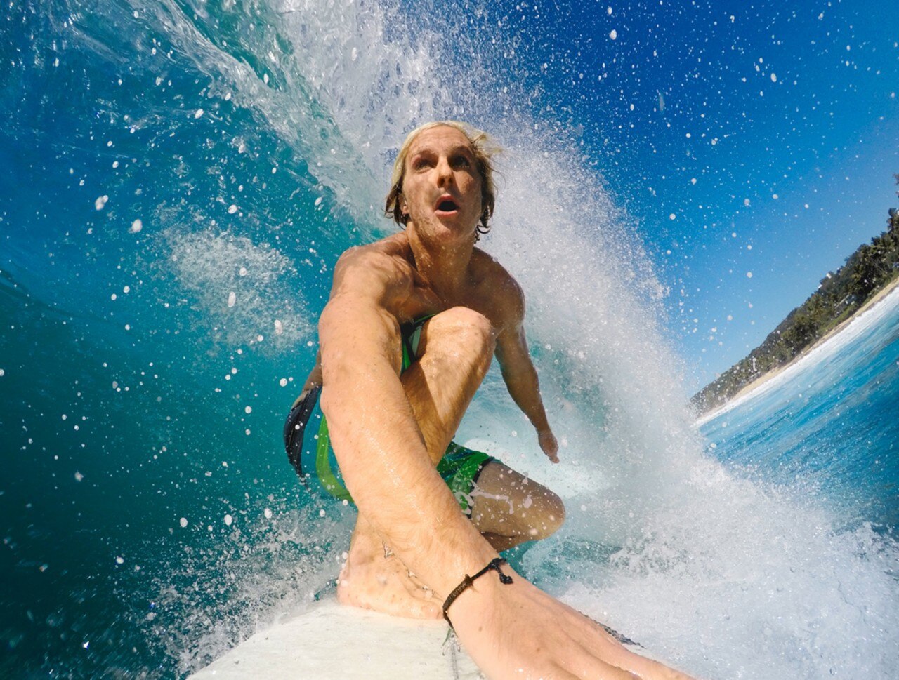 Christopher Farro surfing a big wave