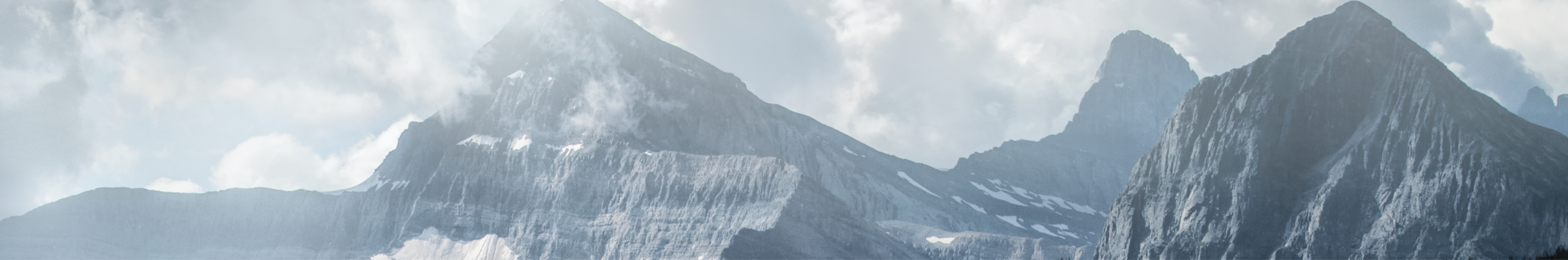 Landscape shot of a foggy mountain