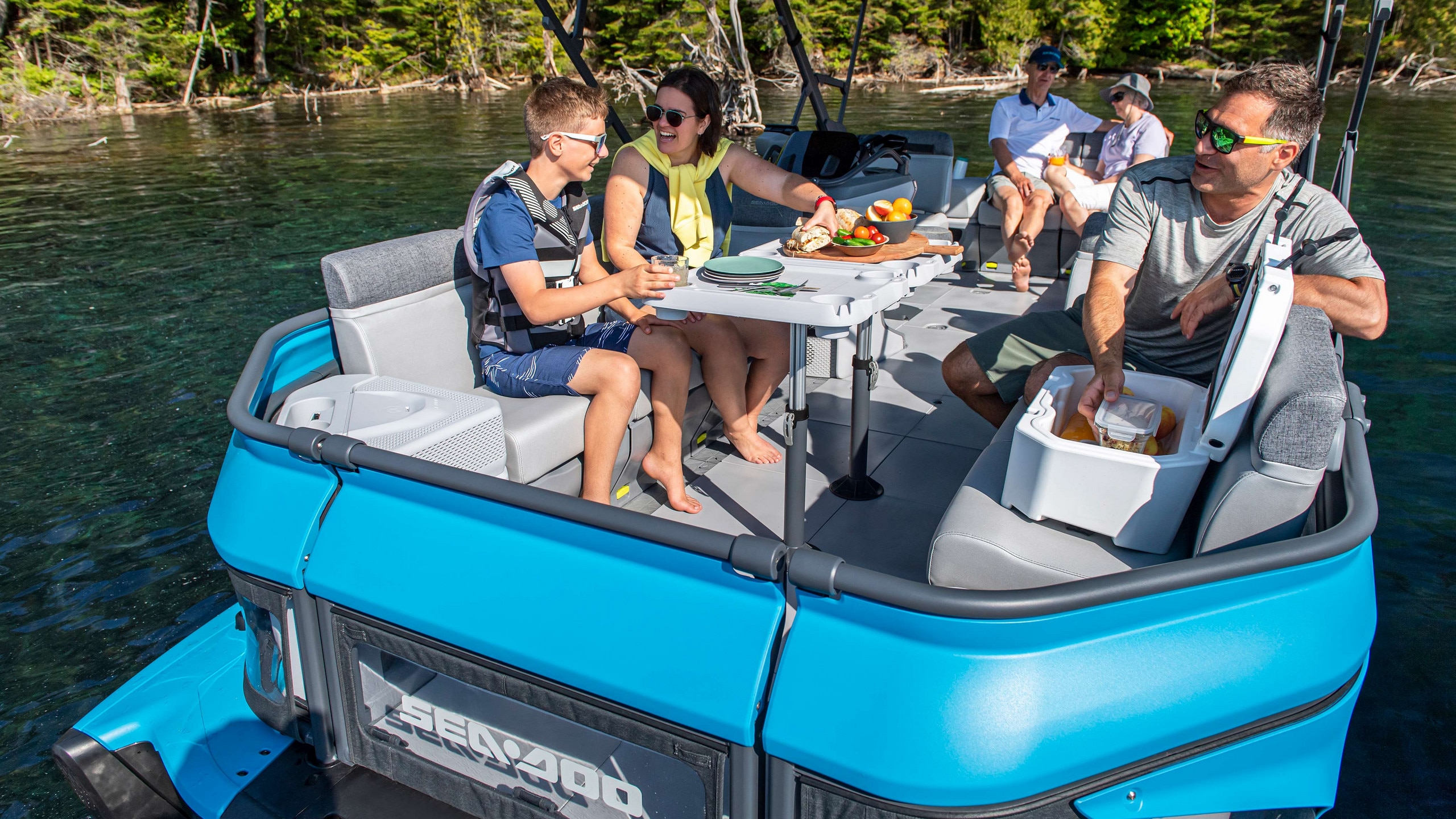 Family cruising on a lake with a Sea-Doo Switch Cruise