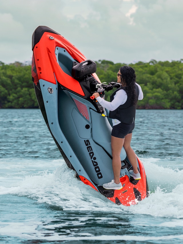 Couple riding a Sea-Doo Spark Trixx personal watercraft 2027