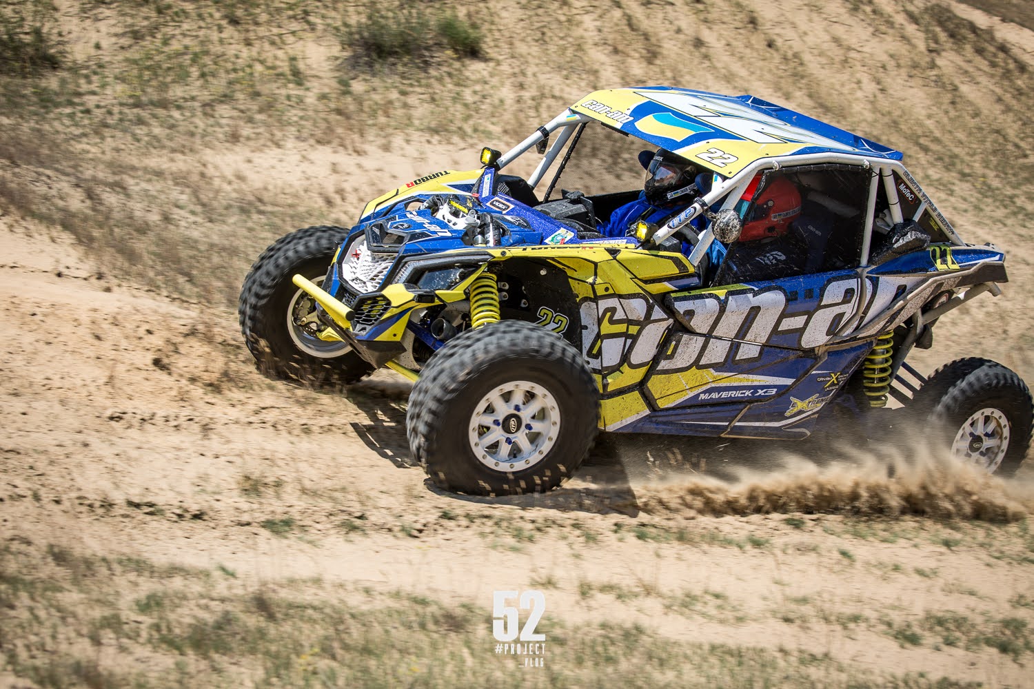 Man driving on Can-Am Maverick in the sand