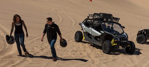 Man driving a Maverick in the desert