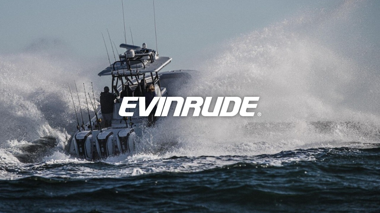Men fishing on a boat propulsed by Evinrude