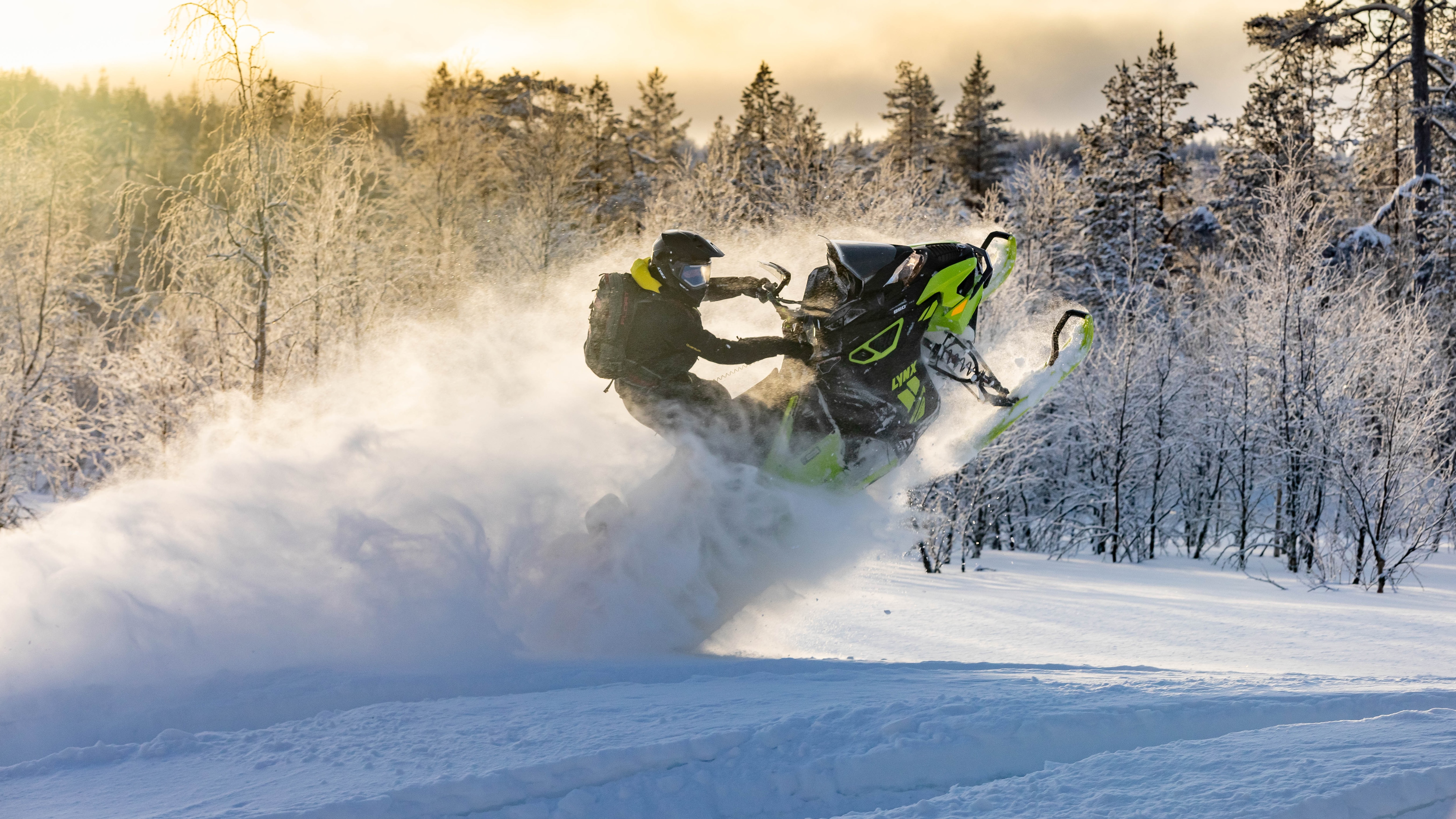 Man on a 2021 Lynx snowmobile