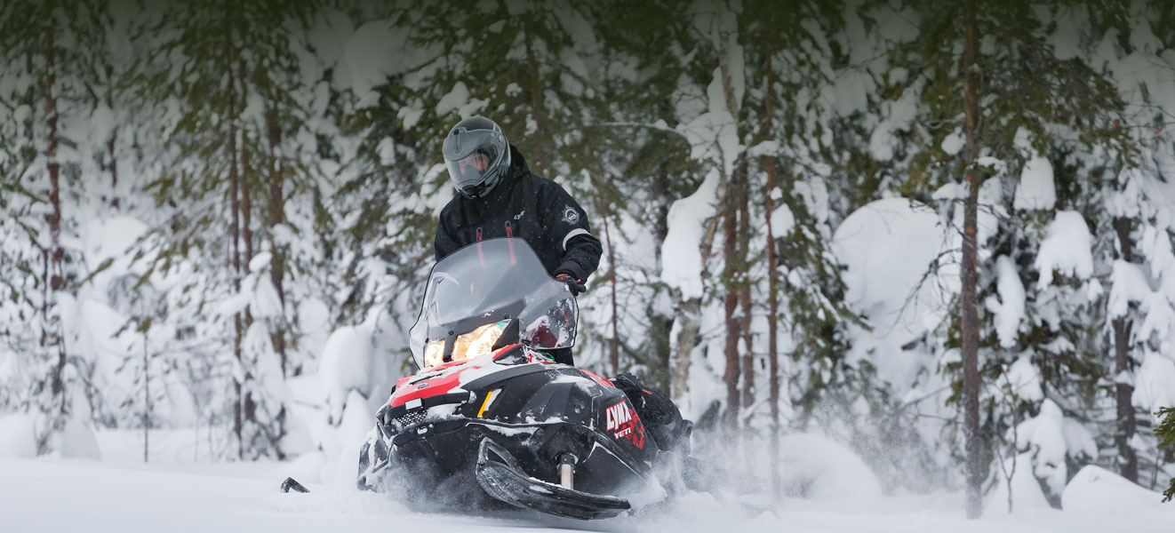 Man driving his 59 Yeti through snow