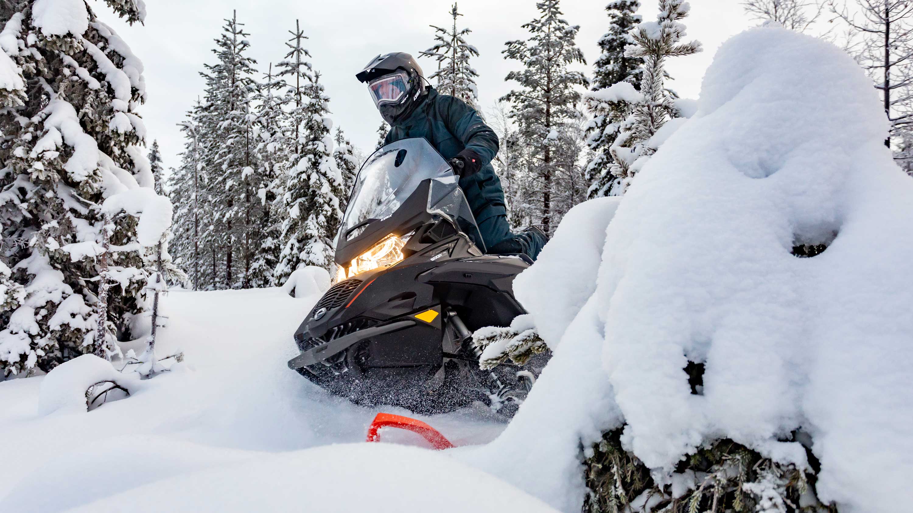 Lynx 49 Ranger Pro snowmobile riding in deep snow