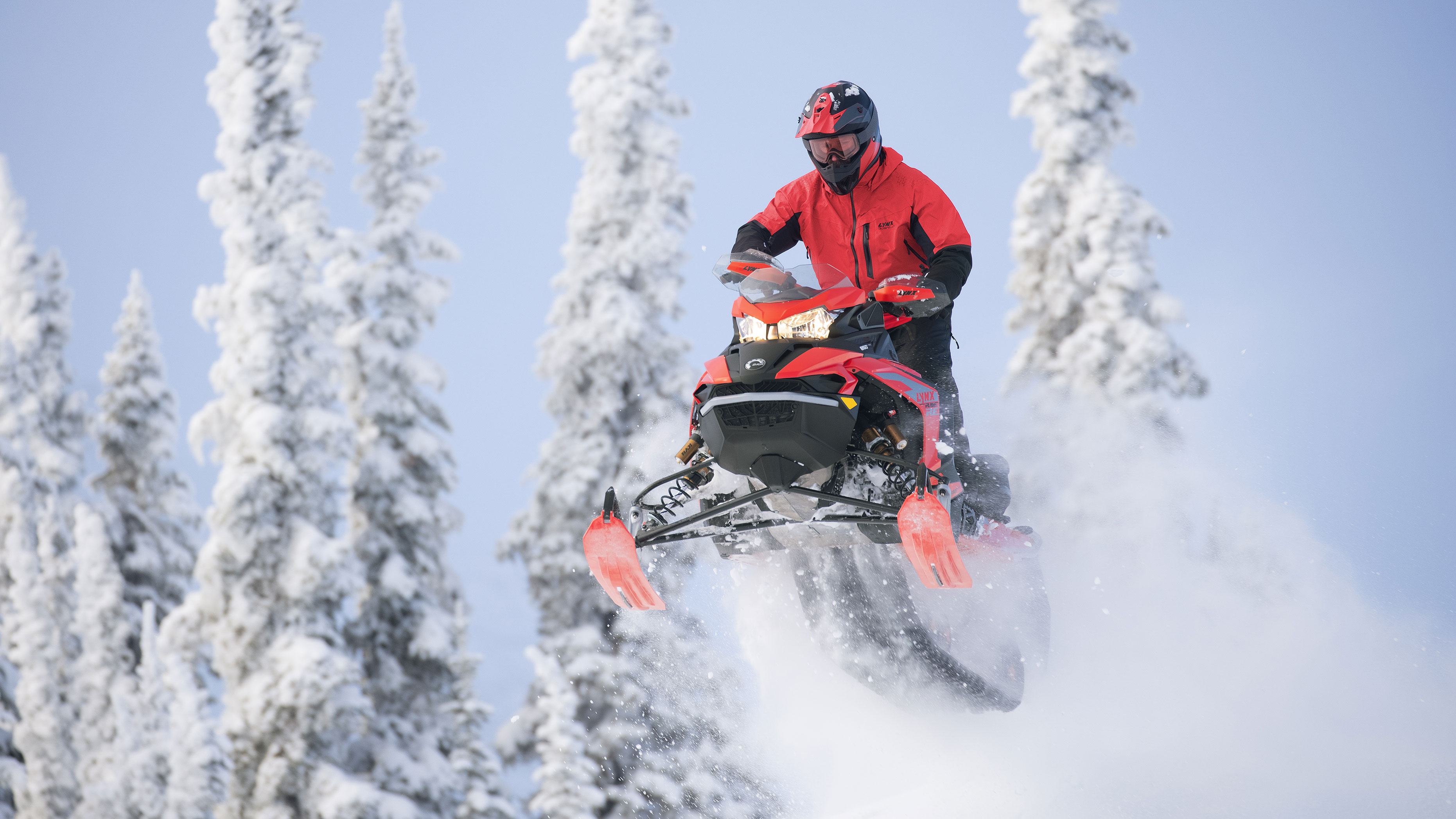 Man riding a Lynx snowmobile