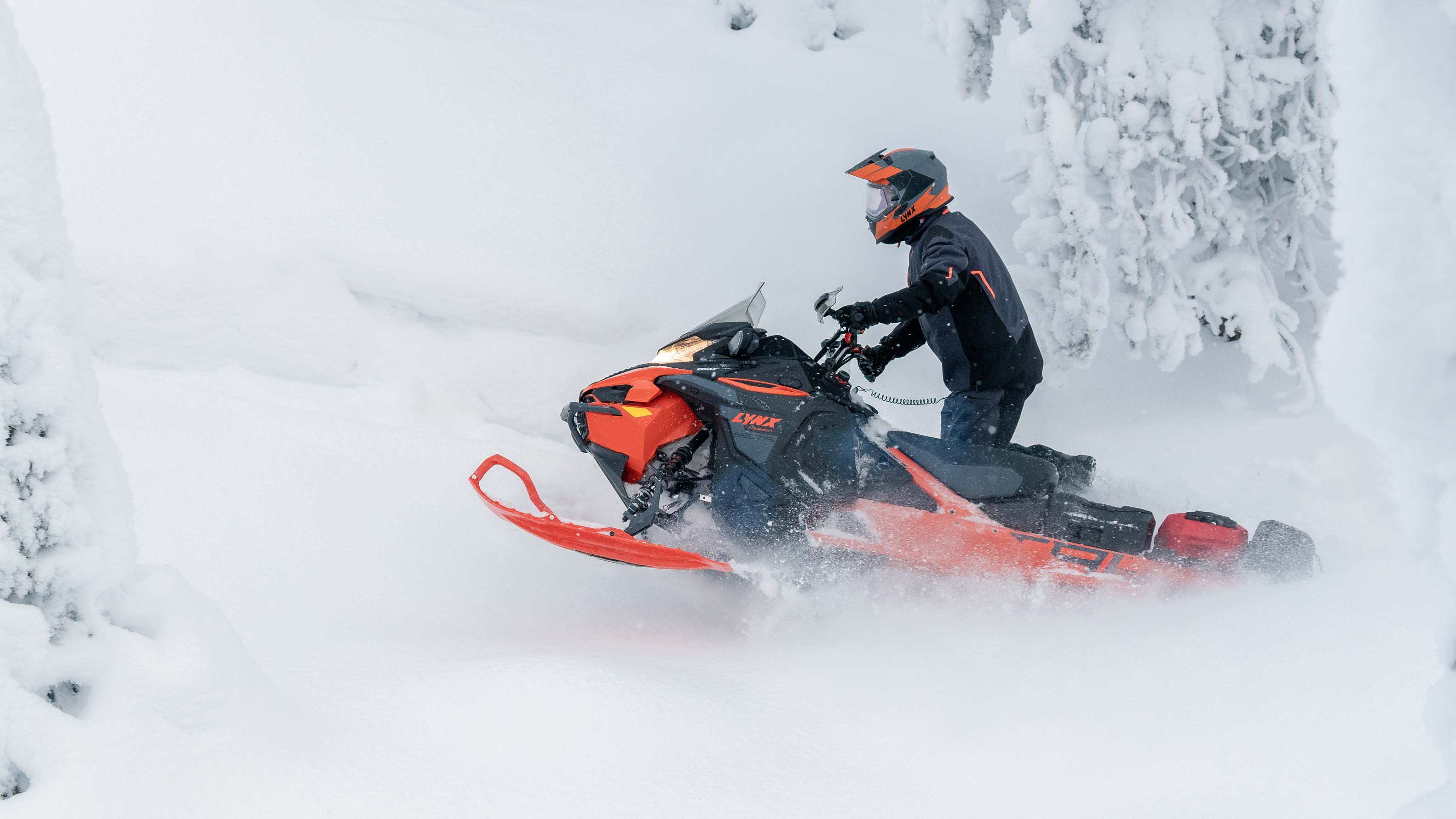 LinQ accessorized Lynx Xterrain Brutal snowmobile riding in deep snow