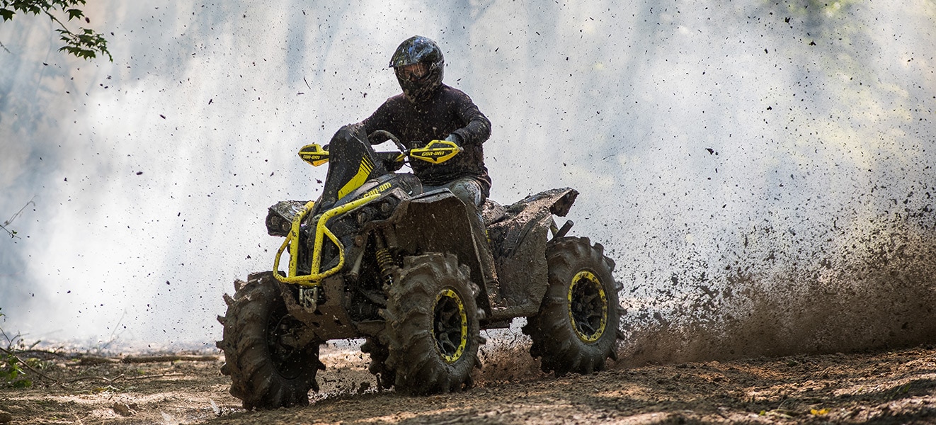 Man drifting through mud while driving his Renegade