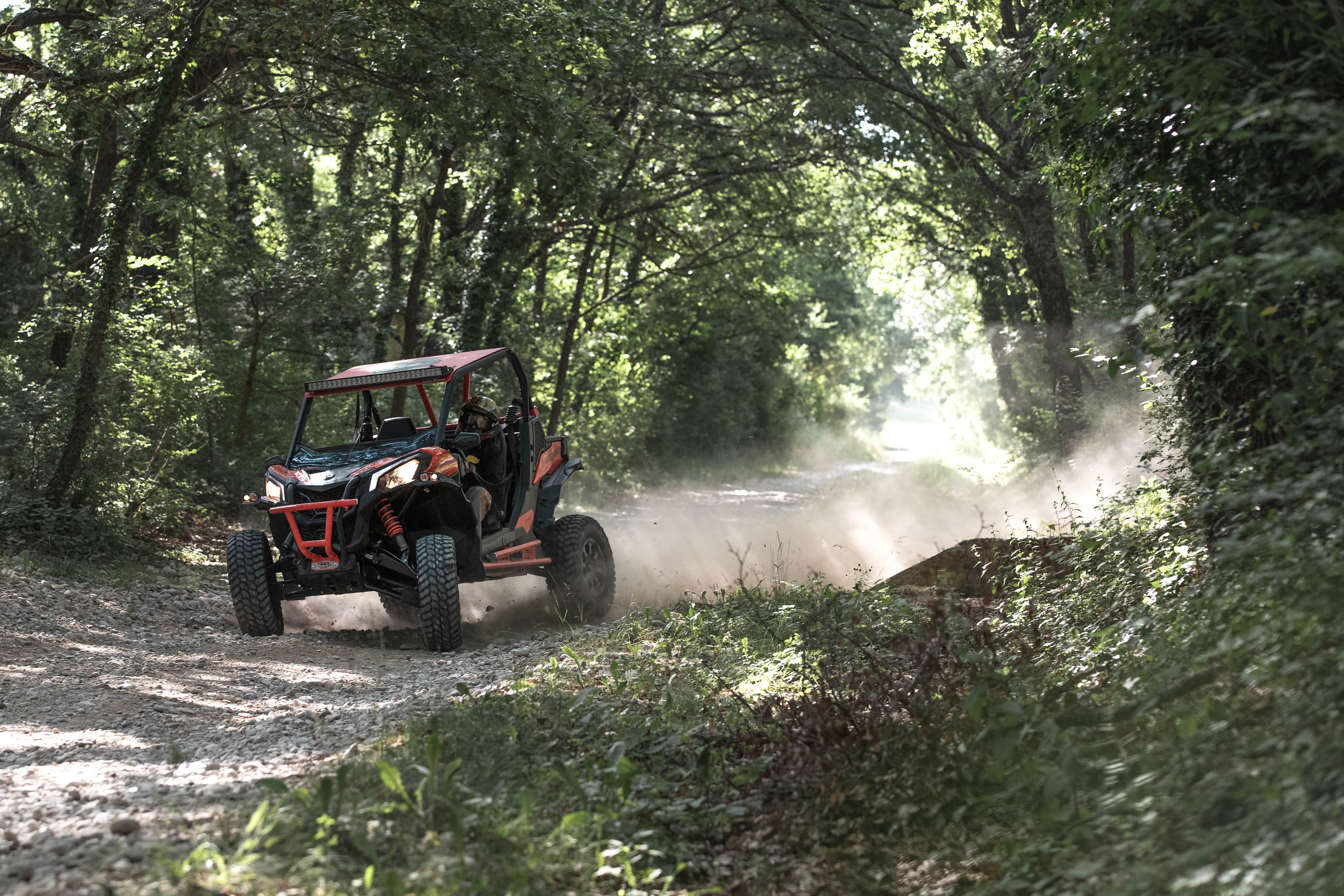 A rider in their Can-Am SxS vehicle