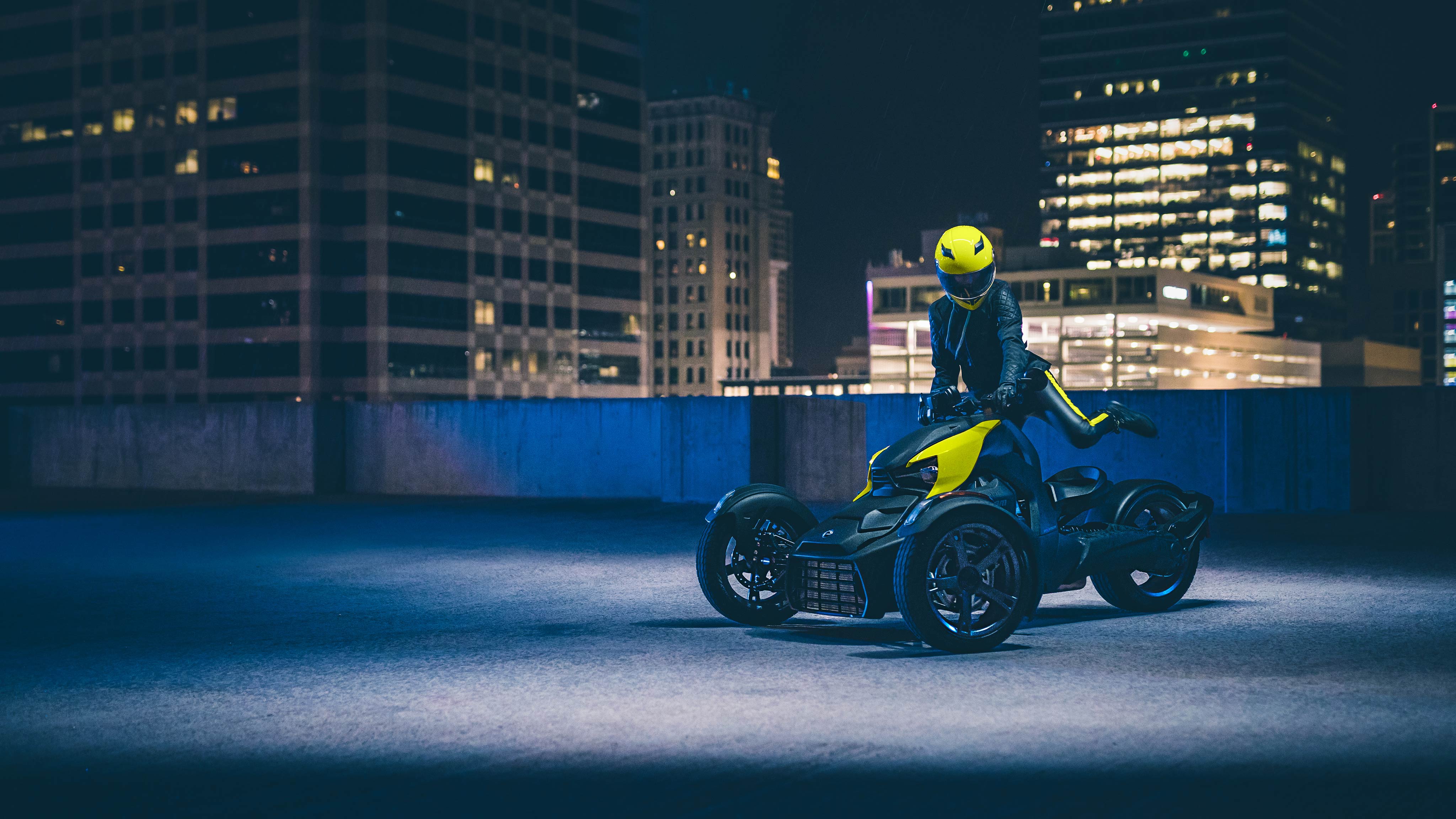 Woman standing on her Can-Am Ryker