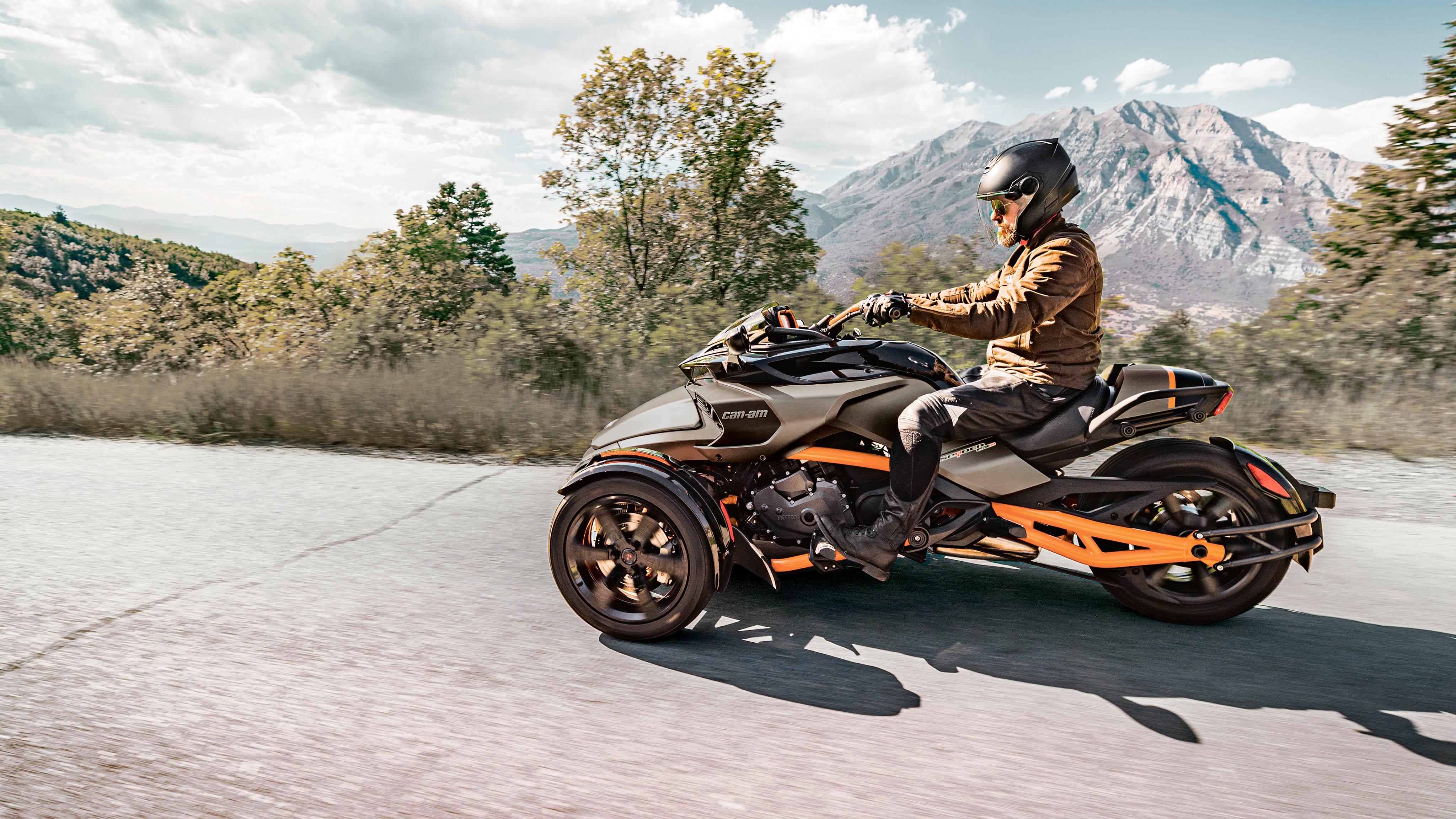 Man driving his Spyder F3 on a scenic route