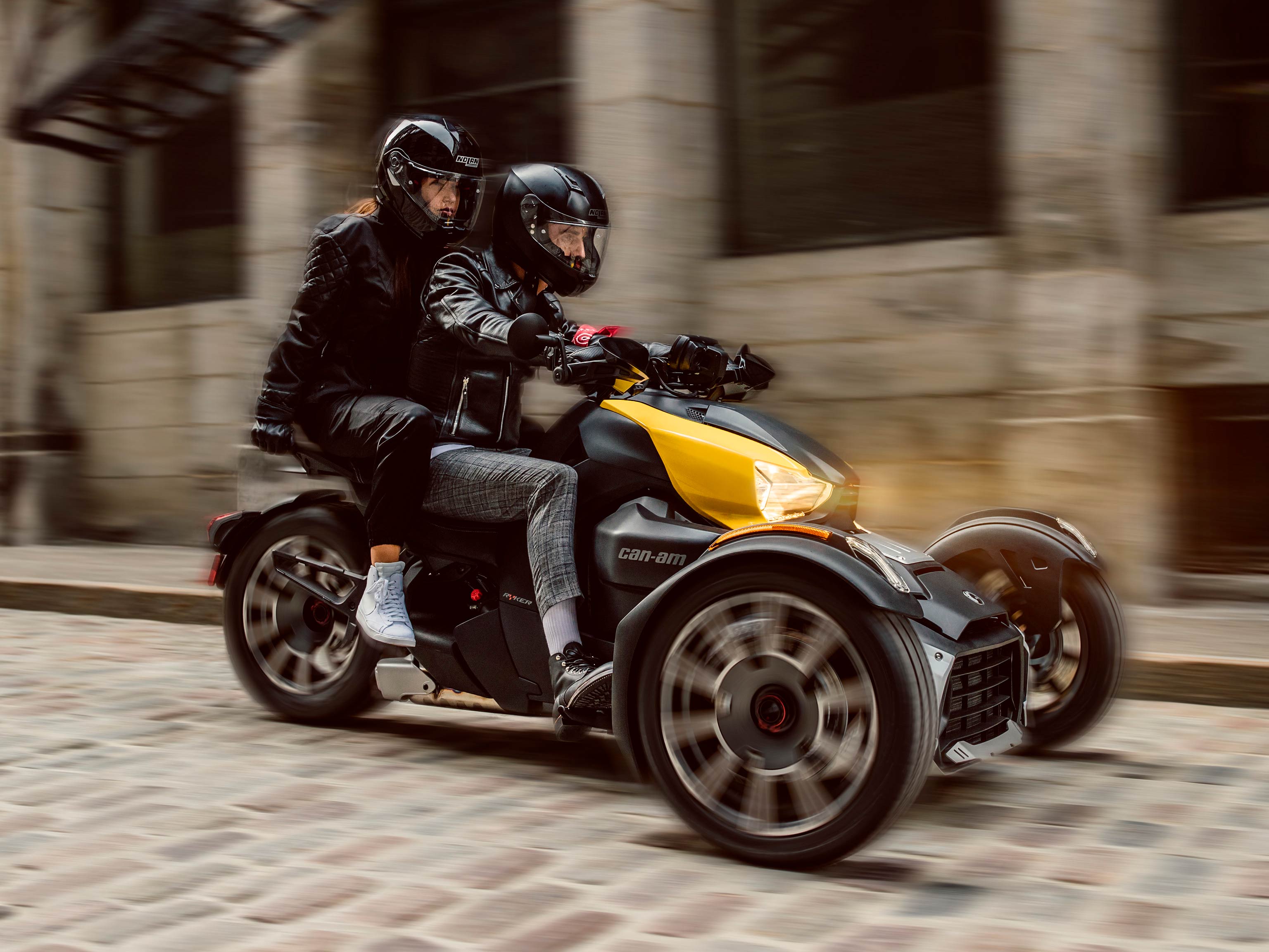 Woman riding her Can-Am Ryker in the desert