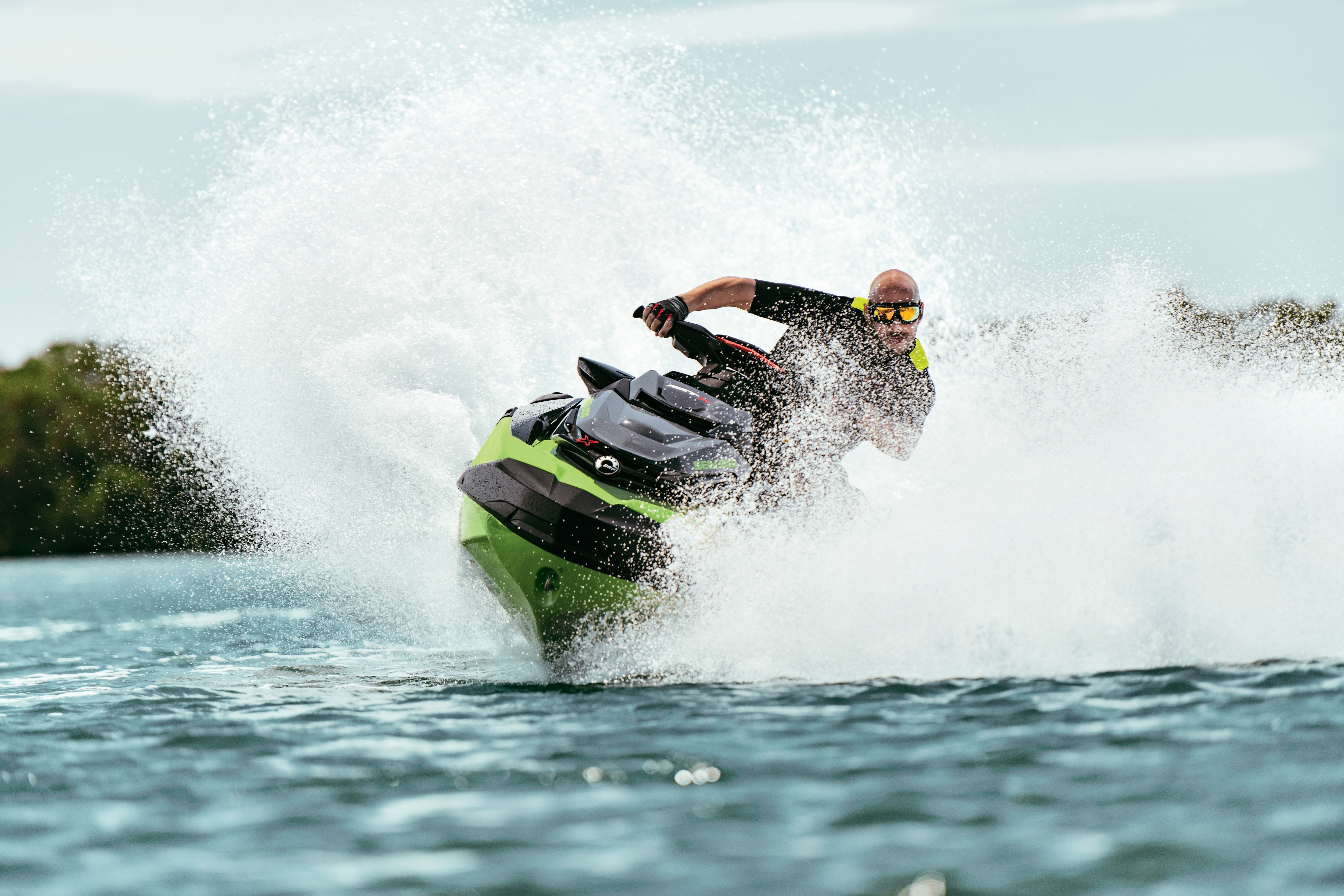 Man riding and drifting his Sea-Doo RXT-X