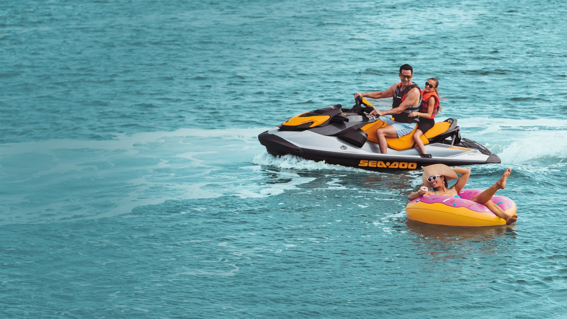 Family riding a Sea-Doo GTI SE