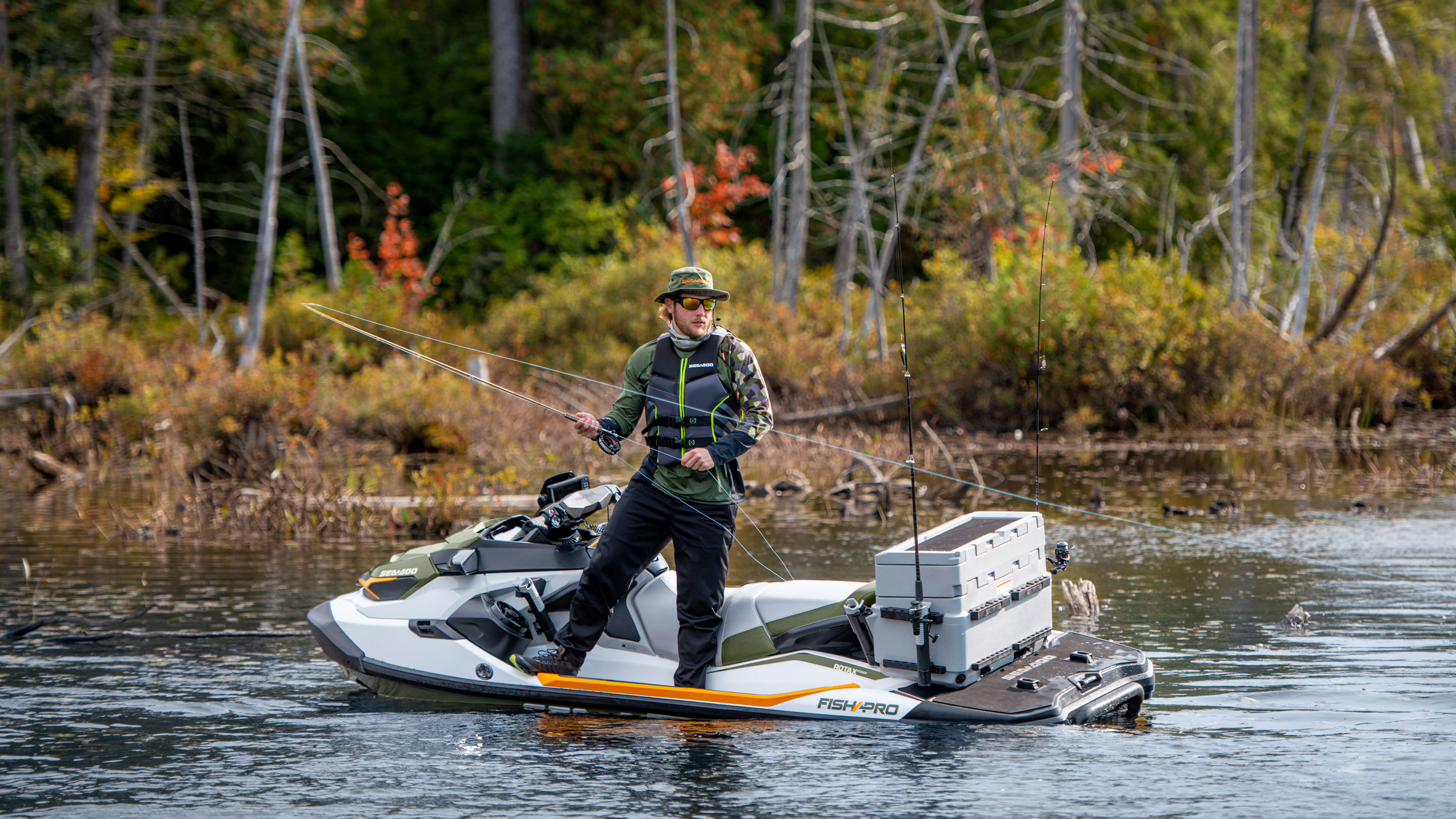 Men Fishing standing on his Sea-Doo FISH PRO