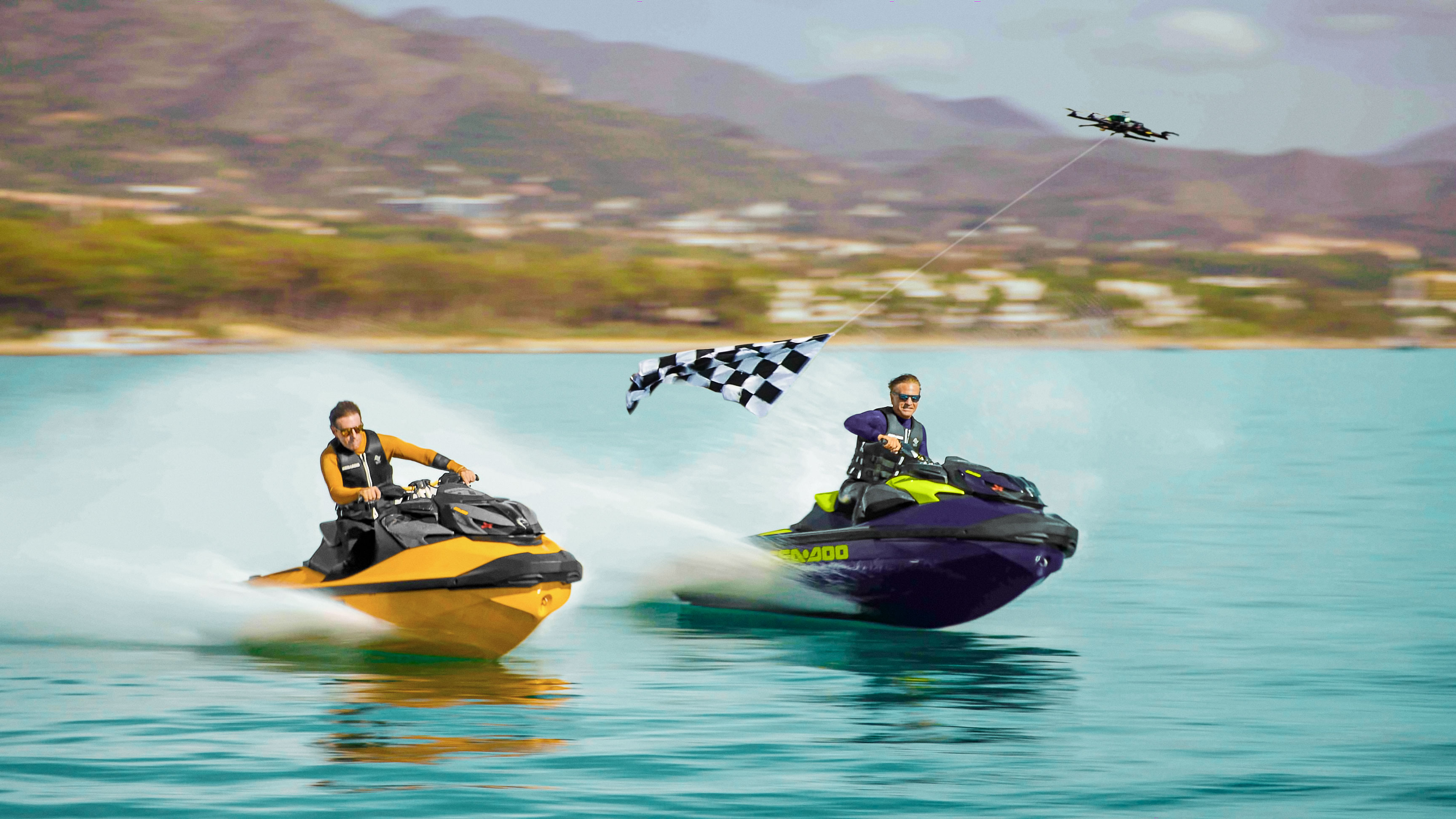 2 men racing with Sea-Doo RXP-X