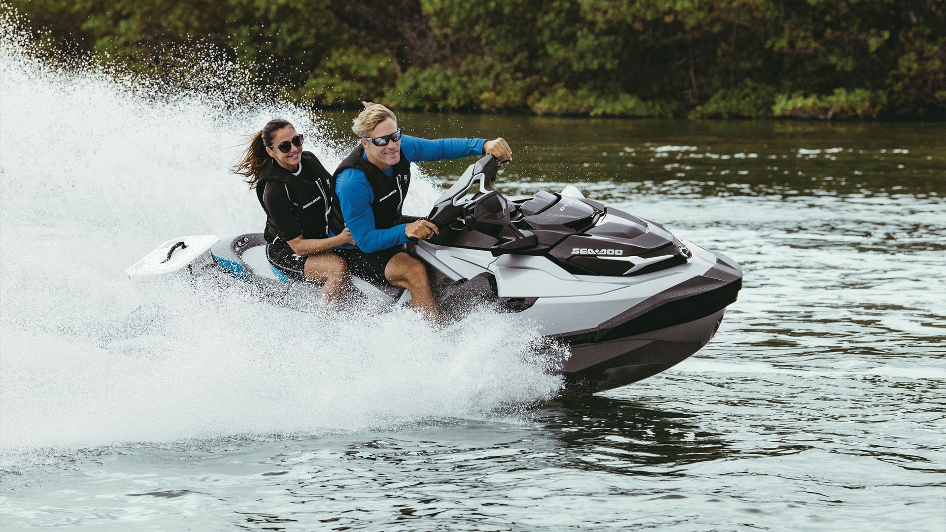 How do you safely ride a Sea-Doo with a passenger?